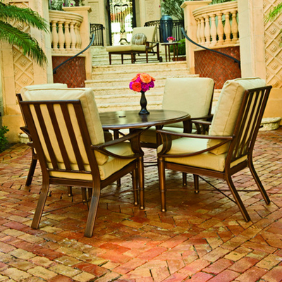 Classic Motifs Combine with Comfy Cushions to Form This Outdoor Patio Dining Set