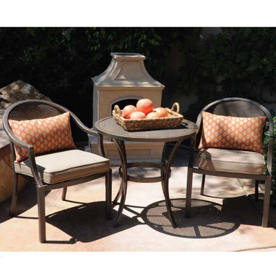 An Outside Furniture Set Featuring French-Inspired Chairs & Bistro Table
