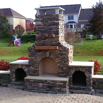 A Custom Stone Fireplace That Will Add a Special Touch to Your Outdoor Room