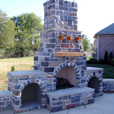 Attractive Custom Stone Outdoor Fireplace Built to Your Needs & Desires